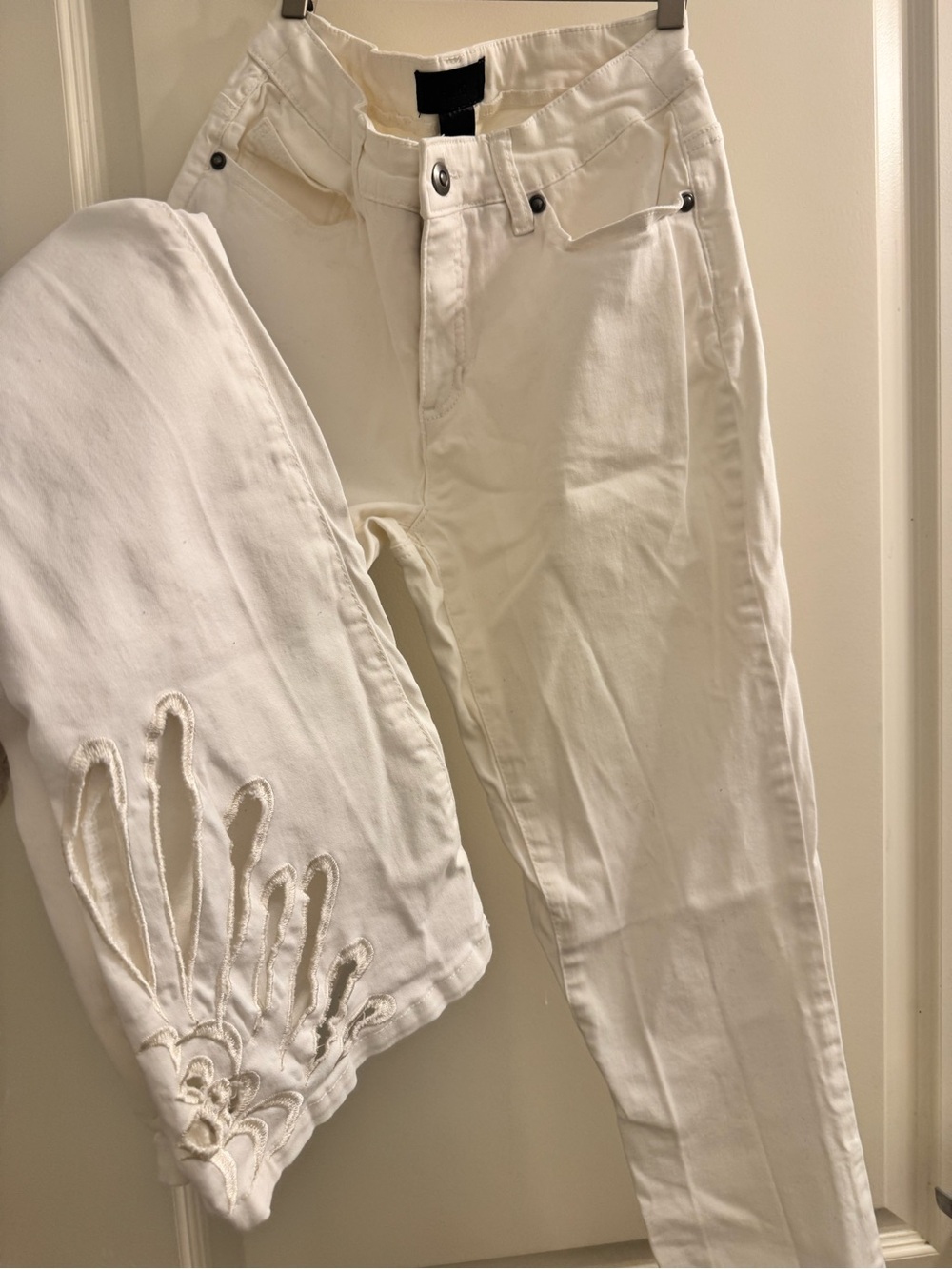 Women's White Skinny Jeans with Hem Cutout Detail